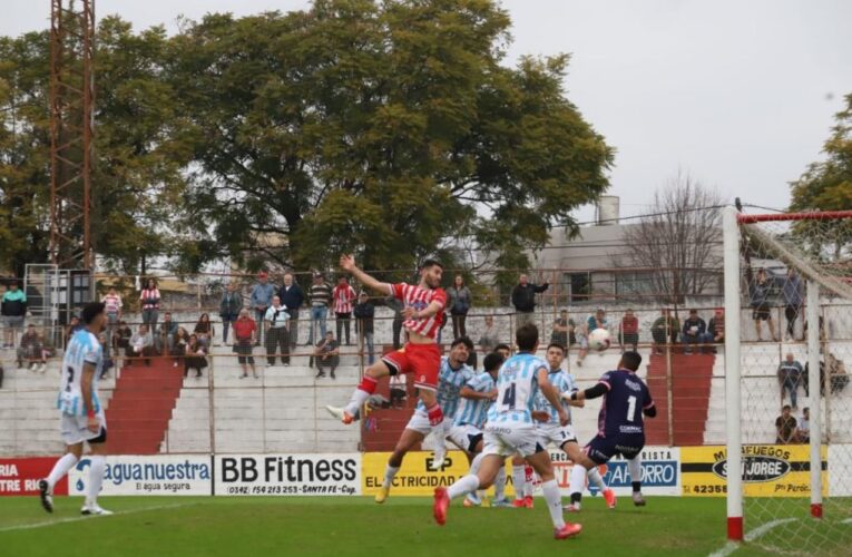 Racing sufrió, pero sacó chapa de líder y rescató un empate